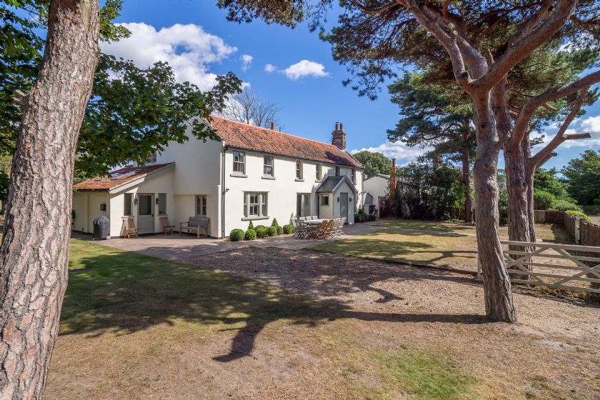 Alexander House White Country Home with Red Tile Roof