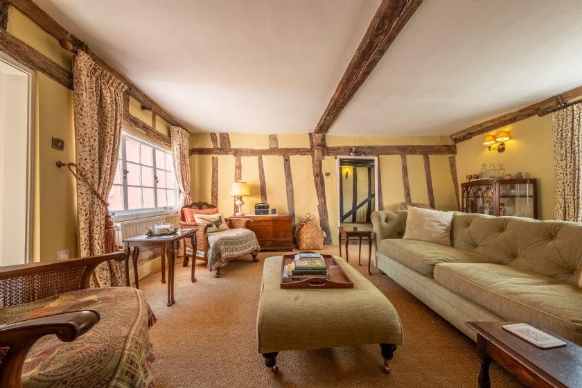 Traditional Living Room with Beamed Ceiling and Period Features