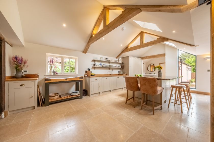 Modern Kitchen with Vaulted Ceiling and Island
