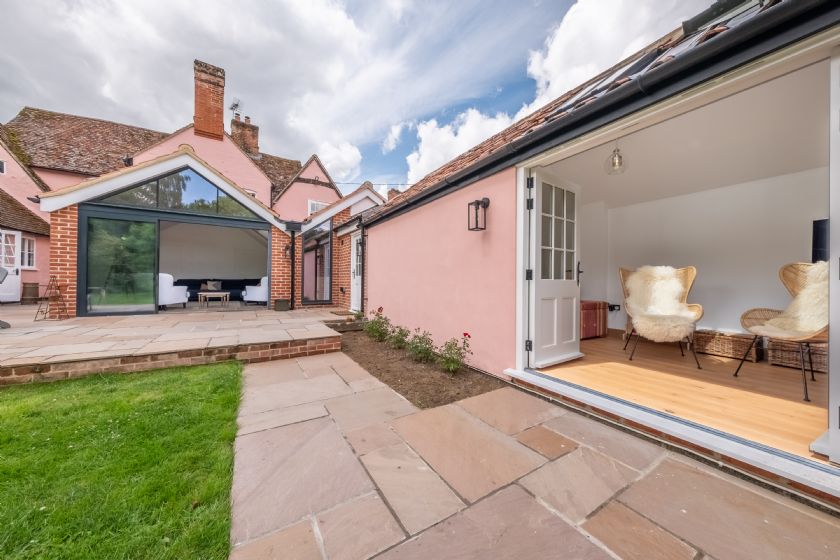Pink Suffolk Cottage with Modern Glass Extensions