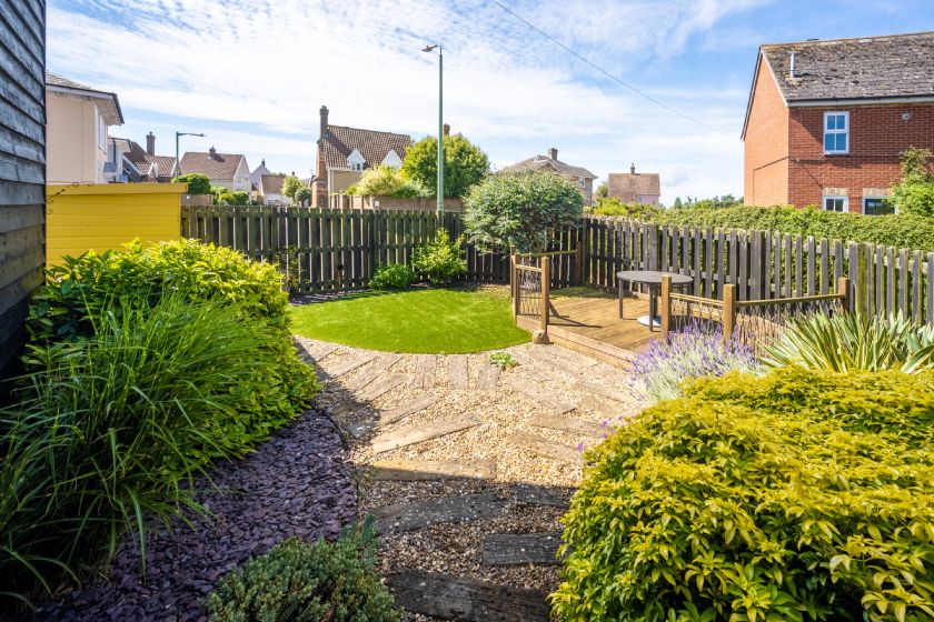 Well-maintained garden with seating area